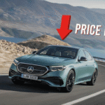 Luxury car with price drop announcement.